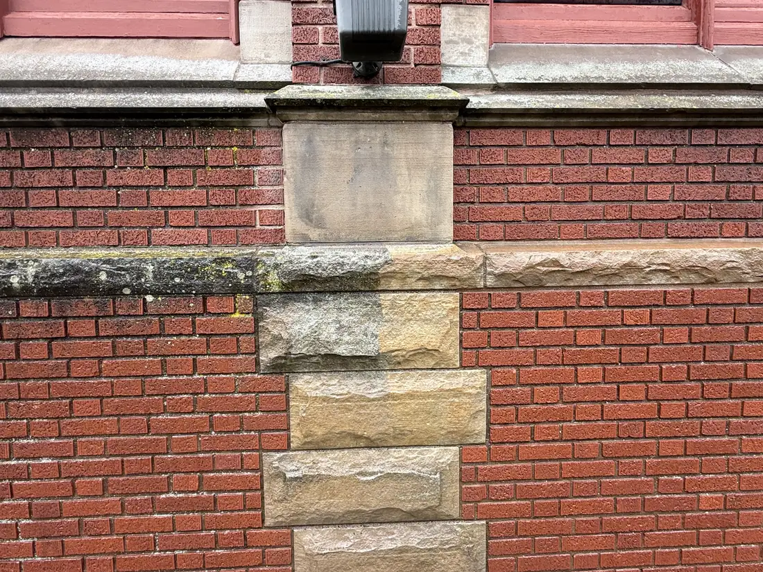 Commercial masonry shown during a real pressure washing project